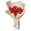 Bouquet of 24 red roses and white fillers, wrapped in brown paper and tied with a cream ribbon.