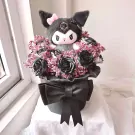 Kuromi plush in a gothic bouquet of black roses and pink baby's breath, with a black bow.