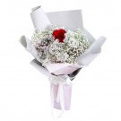 Bouquet of one red Ecuador rose with baby's breath and white paper wrapping.