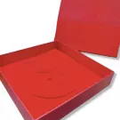 Red jewelry box with molded insert for a pearl necklace.