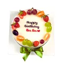 Birthday cake with fruit and "Happy Birthday Ba Ba" text.