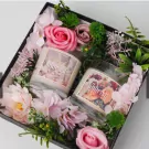 Joy Scented Candle Gift Box with two candles, dried flowers, and greenery.