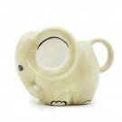 Cute beige ceramic elephant mug with large eye and handle.