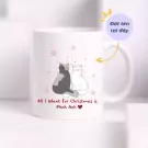 White mug with two cats, snowflakes, and "All I Want For Christmas is Minh Anh" text.