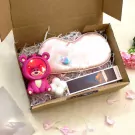 Pink bear lamp, silk eye mask, cloud candle, and photo in gift box.