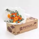 Orange roses and eucalyptus bouquet in white paper, placed on a POTICO.VN flower delivery box.