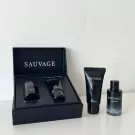 Dior Sauvage EDP mini gift set with eau de parfum and shower gel in black packaging.