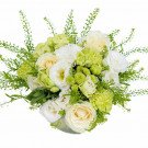 A bouquet of white and green flowers, including roses and hydrangeas, in a vase.