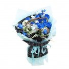 Blue roses and white baby's breath bouquet with tweed and blue ribbon wrapping.