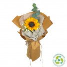 Sunflower bouquet wrapped in brown paper with eucalyptus and baby's breath.