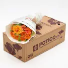 Orange roses in a bouquet resting on a Potico.vn flower delivery box.