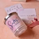 "Super Teacher" scented candle with gift cards.
