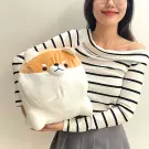 Chonky Shiba plush toy, 50cm, with brown and white fur, held by a person wearing a striped shirt.