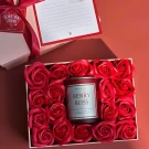 Gift box with red roses and "Berry Bliss" scented candle.
