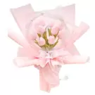 Pink tulip bouquet in a clear bubble with a pink ribbon and pearl accents.