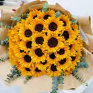Bouquet of sunflowers with eucalyptus.