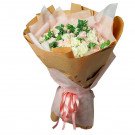 Bouquet of white and pink roses and carnations, wrapped in brown paper and pink tissue paper with a pink ribbon.
