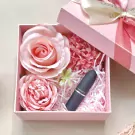 Pink gift box with MAC lipstick and silk roses.