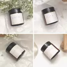 Four scented candles with French labels: Soeur, Fleur, Coeur, and Rêveur.