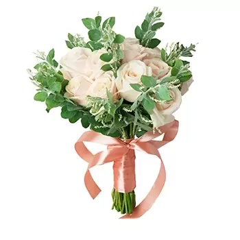 Bridal bouquet of pale pink roses and greenery, tied with a peach ribbon.
