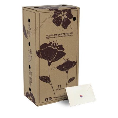 Kraft box with floral print, accompanying a small cream-colored envelope with a seal.