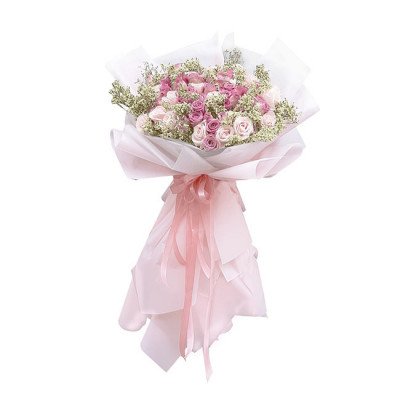 Pink and white rose bouquet with baby's breath, wrapped in white and pink paper with a pink ribbon.