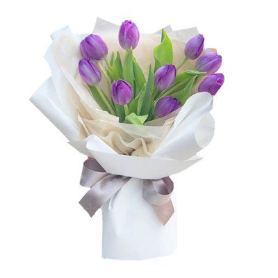 Bouquet of 10 purple tulips with white and tan paper wrap, tied with a grey ribbon.