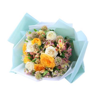 A bouquet of yellow and white roses, alstroemeria, and scabiosa in light blue tissue paper.