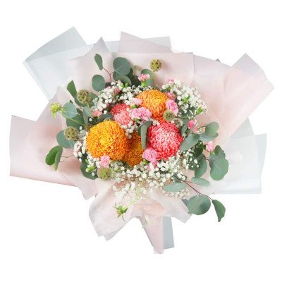 Vibrant bouquet of orange and pink chrysanthemums, baby's breath, and greenery.