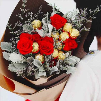 Red roses and Ferrero Rocher chocolates bouquet.