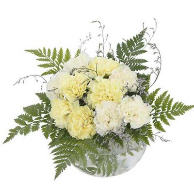 White and yellow carnations in a clear bowl with ferns.