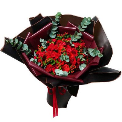 A bouquet of red roses and carnations with eucalyptus and red berries, wrapped in black and burgundy paper.
