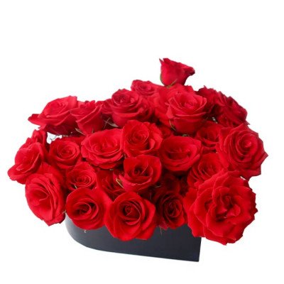 Heart-shaped box overflowing with vibrant red roses.