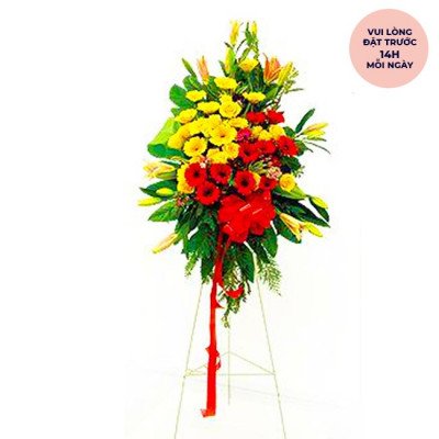 Grand flower stand with yellow and red flowers, red ribbon, and pink circle text.