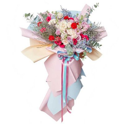 Bouquet of pink and red roses, carnations, daisies, hydrangeas, delphiniums, and baby's breath in pastel and red wrappers.