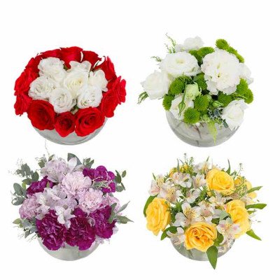 Four glass bowls with assorted flower arrangements: red and white roses, white roses with green filler, purple and pink carnations, and yellow roses with white alstroemeria.