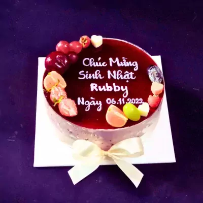 Mulberry yogurt mousse cake with fruit, "Happy Birthday Rubby" message, and date 06.11.2022.