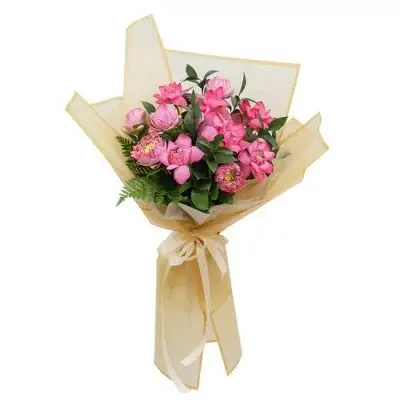 Pink lotus flowers in a golden wrap with a ribbon tie.