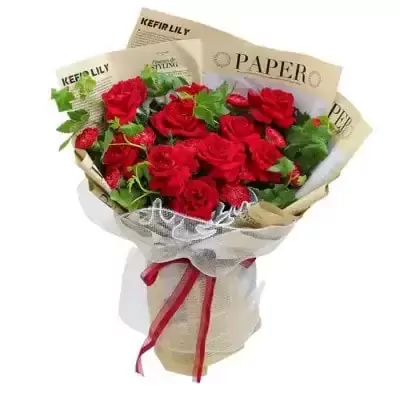 Red roses and carnations with greenery, wrapped in paper and ribbon.