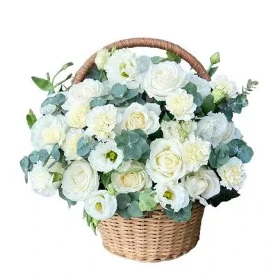 Basket of white roses, carnations, and lisianthus with greenery.