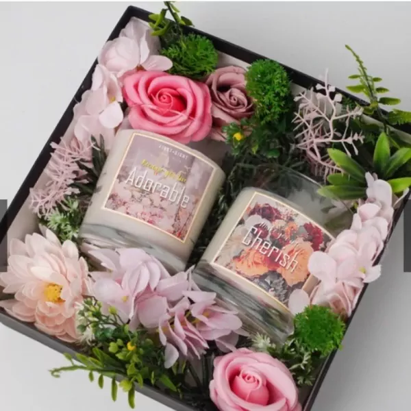 Joy Scented Candle Gift Box with two candles, dried flowers, and greenery.