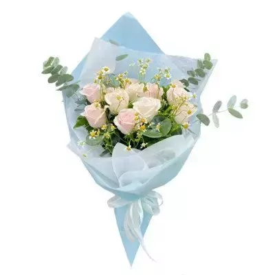 Bouquet of pink and white roses with small white flowers and green leaves, wrapped in light blue paper and tied with a white ribbon.