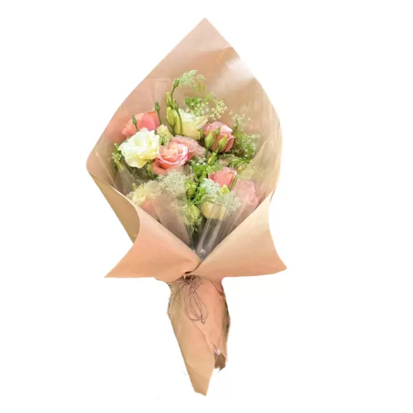 Bouquet of pink and white roses and lisianthus flowers in Kraft paper, tied with twine.
