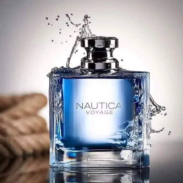 Nautica Voyage cologne bottle with water splashing around it.