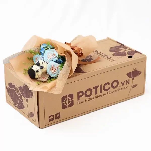 Bouquet of blue roses and a stuffed panda with a bow on a cardboard box labeled "POTICO.VN".