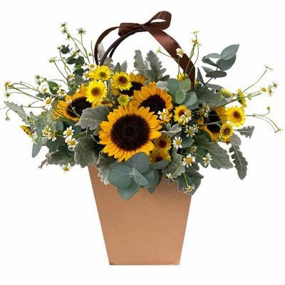 Basket of sunflowers, yellow daisies, and eucalyptus with a brown ribbon.