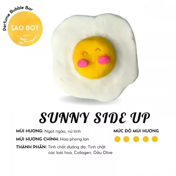 Sunny Side Up bath bomb shaped like a fried egg with a smiley face.