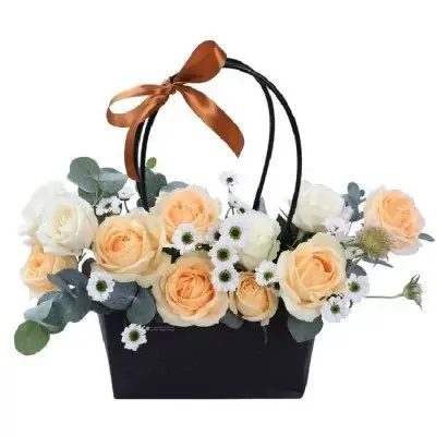 A basket of peach roses, white roses, and daisies with eucalyptus leaves, tied with a brown ribbon.