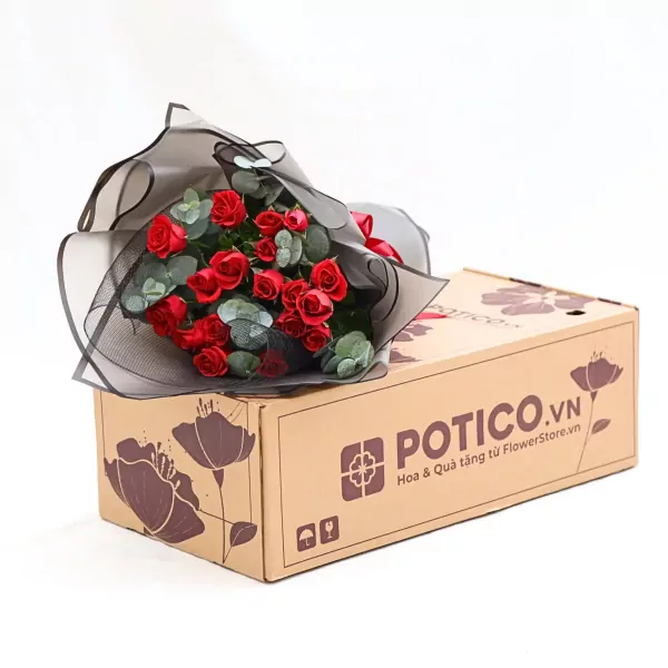 A bouquet of red roses wrapped in black mesh sits on a cardboard box with "POTICO.VN" printed on it.