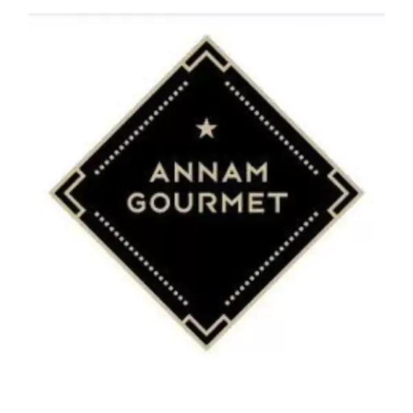 Diamond-shaped logo for Annam Gourmet, featuring the text "ANNAM GOURMET" in white on a black background.